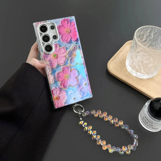 Samsung case with purple butterfly charm and wrist strap
